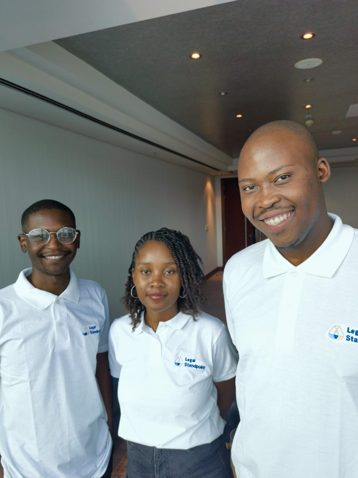 Legal Standpoint team in branded polo shirts